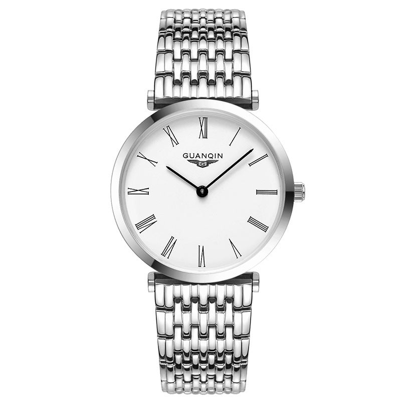 Silver watch with a white face on a white background