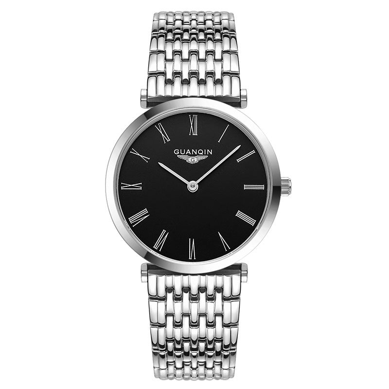 Silver watch with black dial on a white background