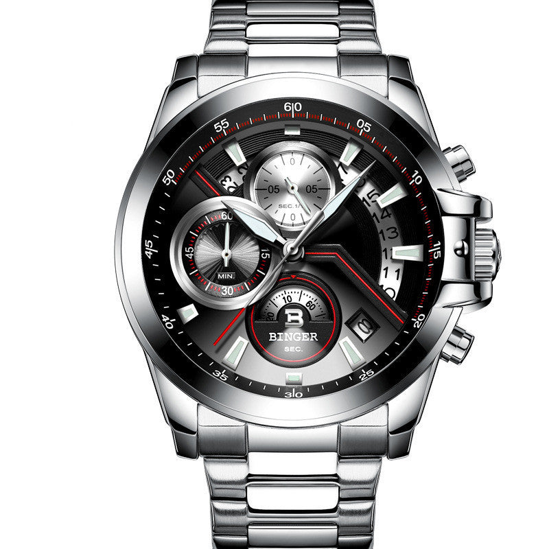 Silver wristwatch with black dial and red accents on a white background