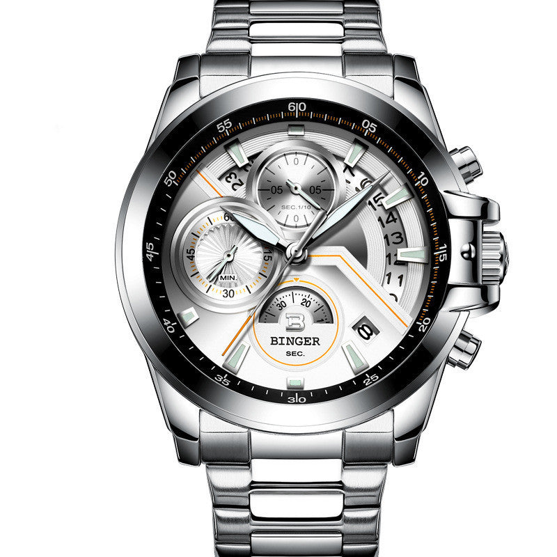 Silver wristwatch with a detailed face on a white background