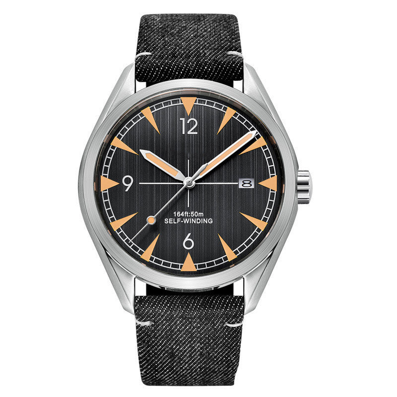 Watch with black strap and black dial on a white background