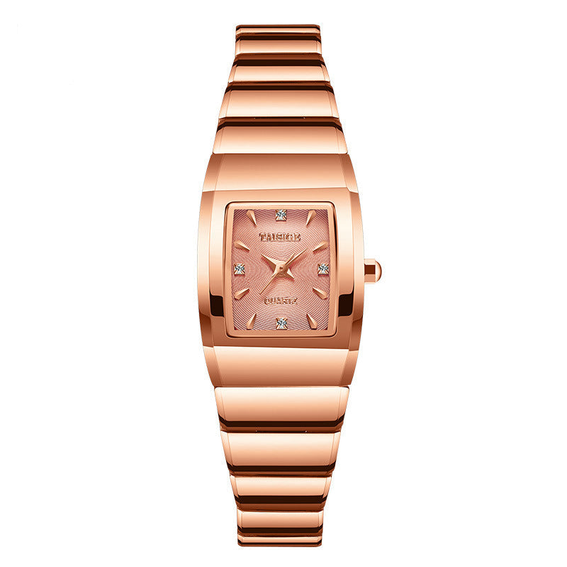 Rose gold watch with a white background