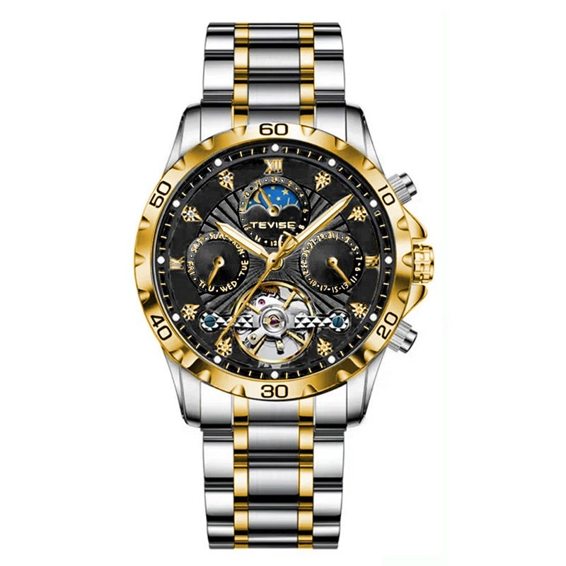 Luxury silver and gold watch with intricate design on a white background