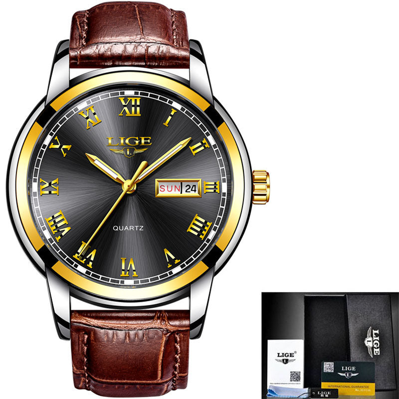Wristwatch with brown leather strap and black dial featuring gold accents, displayed with packaging.