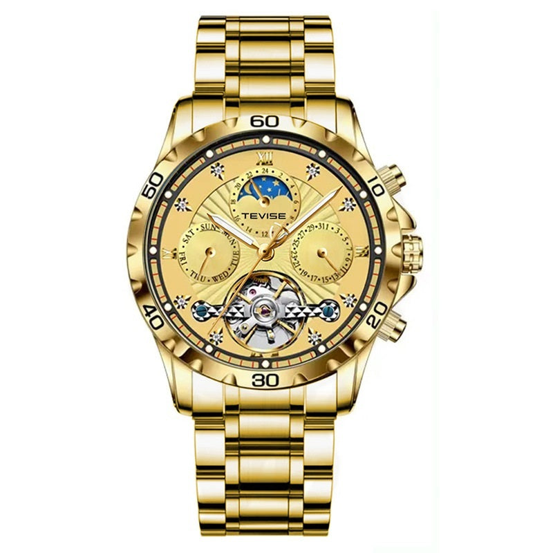 Gold wristwatch with detailed face on a white background