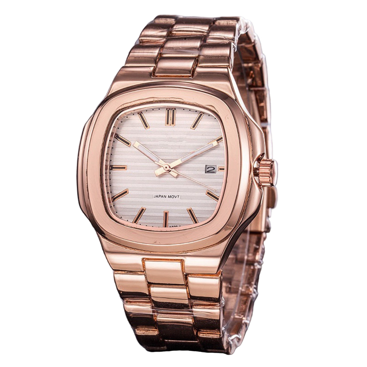 Rose gold watch with a silver face on a dark surface