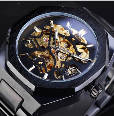 Luxury watch with intricate gold mechanical design on a dark background