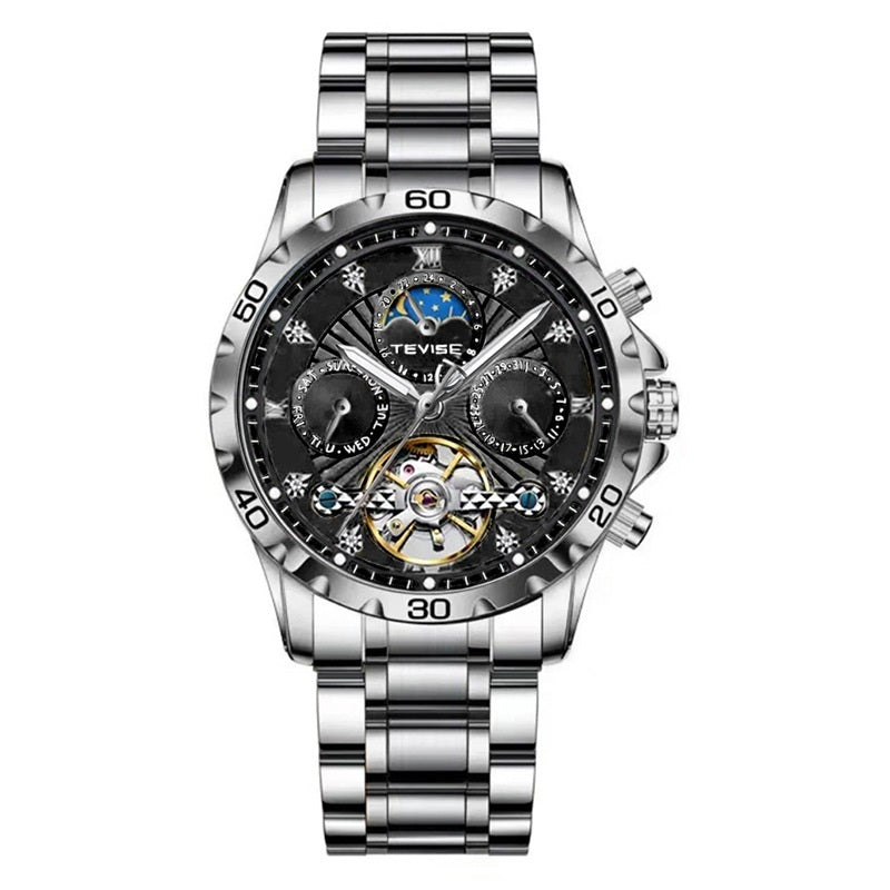 Silver and black watch with detailed face on a white background