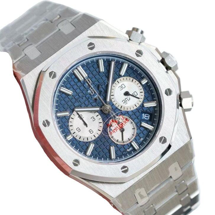 Luxury watch with a blue face and silver case on a white background