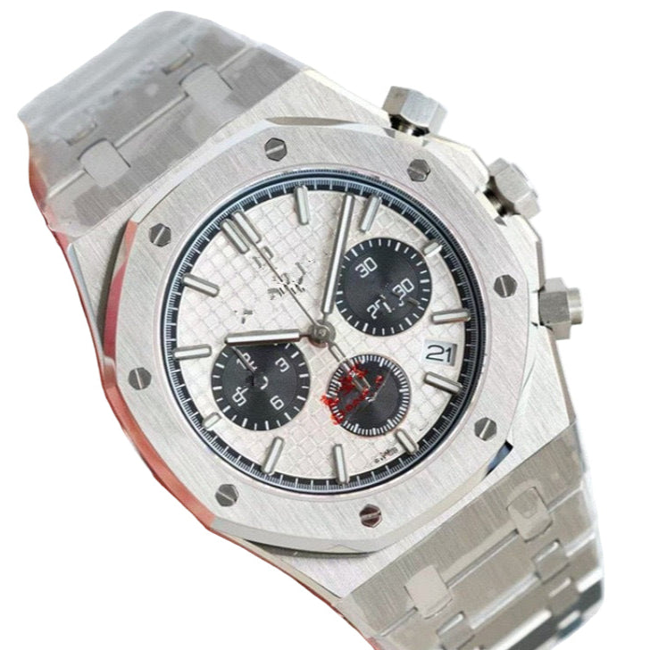 Stainless steel watch with a detailed face on a white background