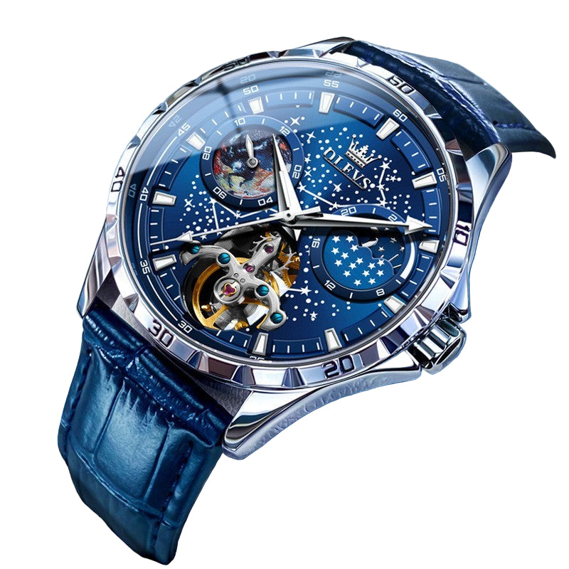Luxury watch with blue face and leather strap on a blue background