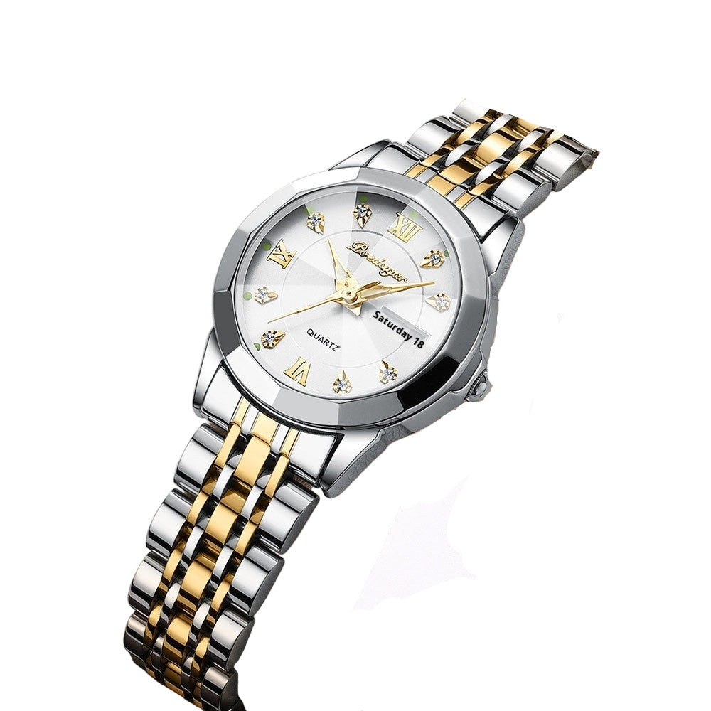 Silver and gold watch with a certificate of conformity on a beige surface