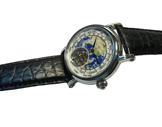 Wristwatch with a detailed face on a white background