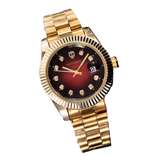 Gold wristwatch with a red face on a white background