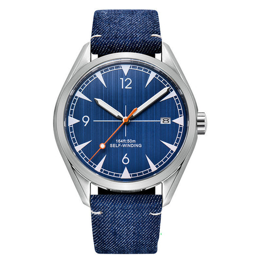 Wristwatch with blue denim strap and blue dial on a white background