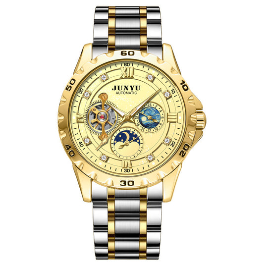 Gold and silver watch with detailed face on a white background