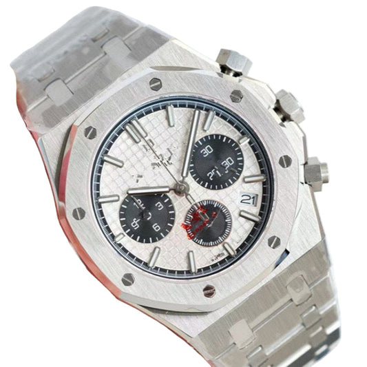 Stainless steel watch with a detailed face on a white background