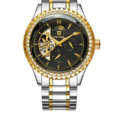 Luxury watch with gold and silver design on a white background