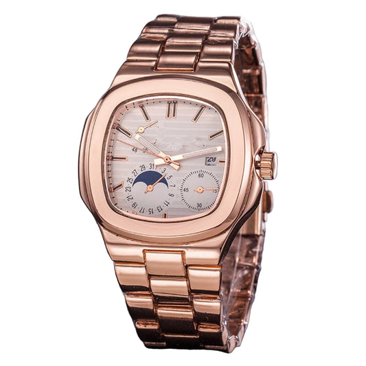 Rose gold watch with detailed face on a dark surface